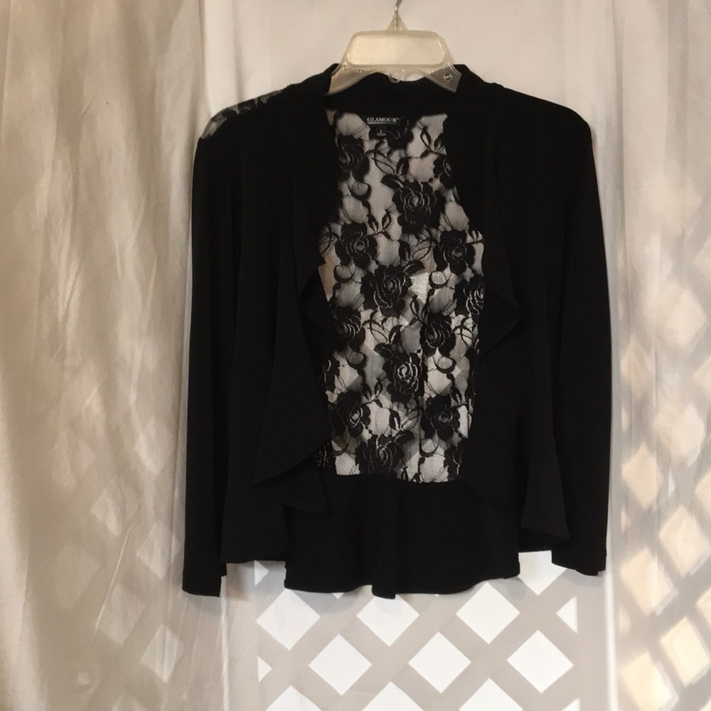 Black cardigan with lace back.